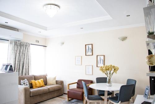 Χώρος καθιστικού στο Mmaset Houses bed and breakfast