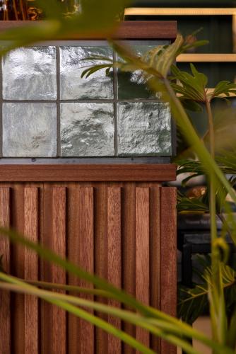 a glass window on a wooden fence at COVE Centrum in The Hague