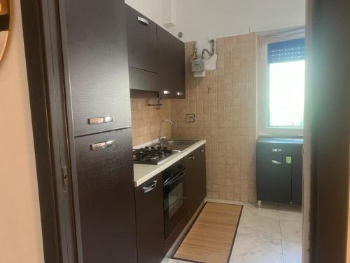 Kuchyň nebo kuchyňský kout v ubytování affittacamere appia nuova 639