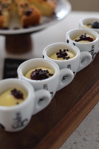 a group of cups of coffee on a tray at Hotel Albatros in Rimini