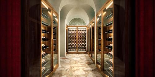 a wine cellar with racks of wine bottles at Delano Dubai at Bluewaters in Dubai