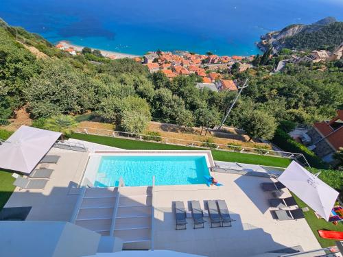 an aerial view of a villa with a swimming pool at Bergeggi Tindari Sunrise in Bergeggi