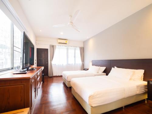 Katil atau katil-katil dalam bilik di home22 Private Residence
