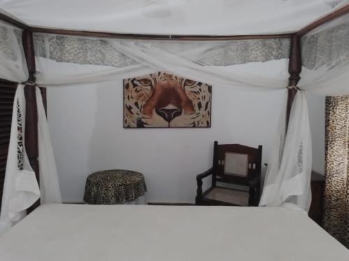 Cama o camas de una habitación en Nyumba Malaika