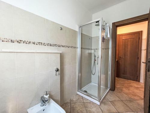 a bathroom with a shower and a sink at Apartment Sambucco - SBO102 by Interhome in Savona