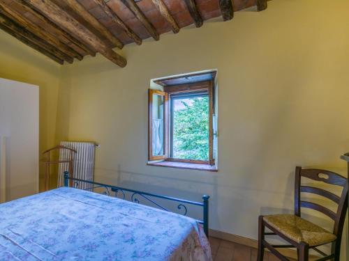 Ένα ή περισσότερα κρεβάτια σε δωμάτιο στο Apartment Poggetto 2 by Interhome