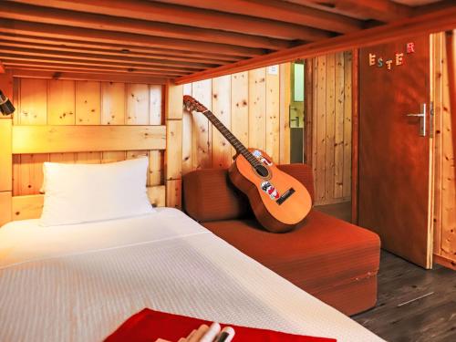 Ένα ή περισσότερα κρεβάτια σε δωμάτιο στο Chalet Chalet Picardie by Interhome