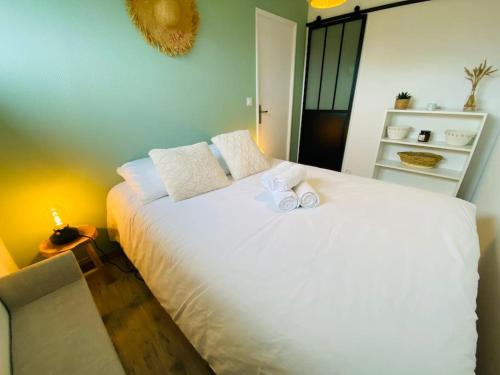 Postel nebo postele na pokoji v ubytování Chez Marcel Cabourg Appartement 2 pièces