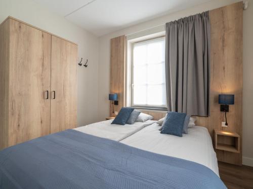 Postel nebo postele na pokoji v ubytování Apartment Ganuenta-1 by Interhome