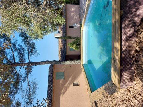 an overhead view of a swimming pool in a building at Holiday Home Le Belvédère d'Estelle by Interhome in Pierrefeu-du-Var