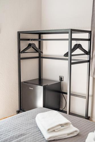 a bedroom with a bunk bed with a desk at Rania Apartments Sea View in Mýkonos City