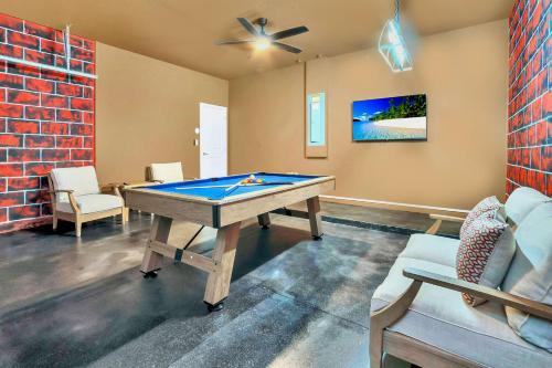 a room with a ping pong table in it at Upstay Luxury Resort Home w Private Pool & Hot Tub in Kissimmee