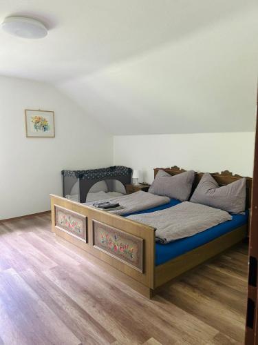 a bedroom with a large bed in a room at Ferienwohnung in Kaning in Kaning