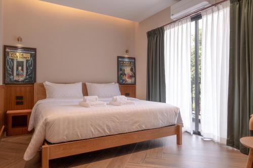 Postel nebo postele na pokoji v ubytování The Willoughby Maerim Hotel