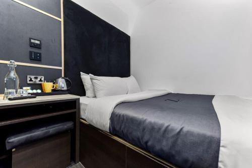 Postel nebo postele na pokoji v ubytování The Z Hotel Trafalgar