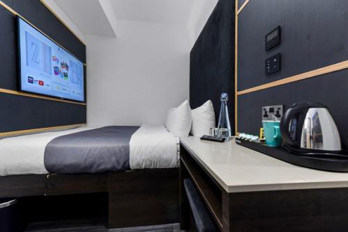 Postel nebo postele na pokoji v ubytování The Z Hotel Trafalgar