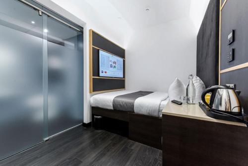 Postel nebo postele na pokoji v ubytování The Z Hotel Trafalgar