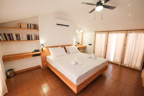 Ένα ή περισσότερα κρεβάτια σε δωμάτιο στο The Cadianda Inn