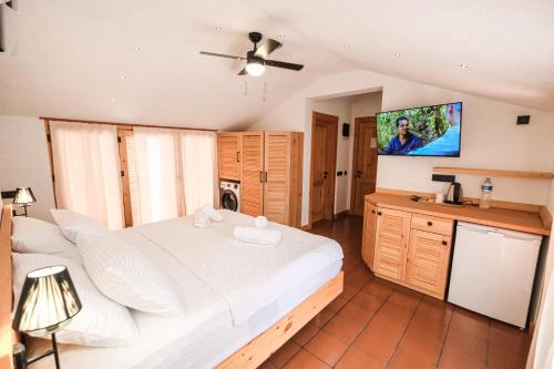 Ένα ή περισσότερα κρεβάτια σε δωμάτιο στο The Cadianda Inn