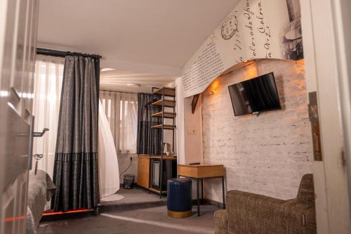TV tai viihdekeskus majoituspaikassa Corner Hot
