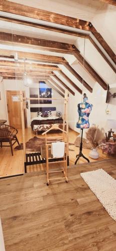 TV a/nebo společenská místnost v ubytování Cuibul Braneanului