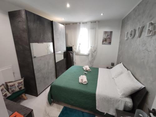 En eller flere senge i et værelse på La casetta di Davide