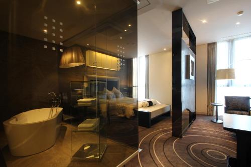Ett badrum på Best Louis Hamilton Hotel Haeundae