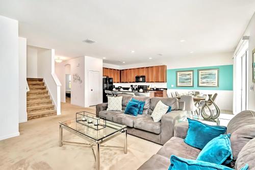 a living room with a couch and a table at Family Resort - 6BR Mansion - Private Pool, Home Theater, BBQ and More in Kissimmee