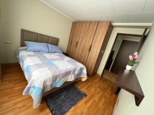 Ένα ή περισσότερα κρεβάτια σε δωμάτιο στο Apartamento Moderno Potosí