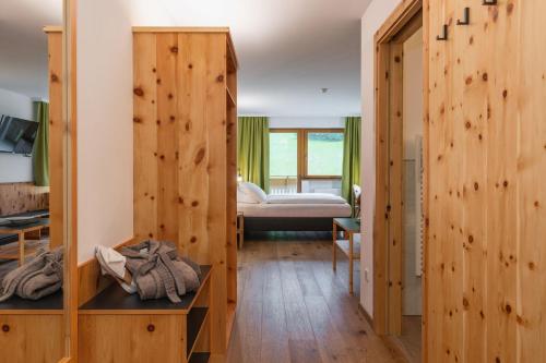 Un ou plusieurs lits dans un hébergement de l'établissement Hotel Asterbel