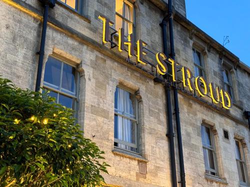 a sign on the side of a building at The Stroud Hotel in Stroud