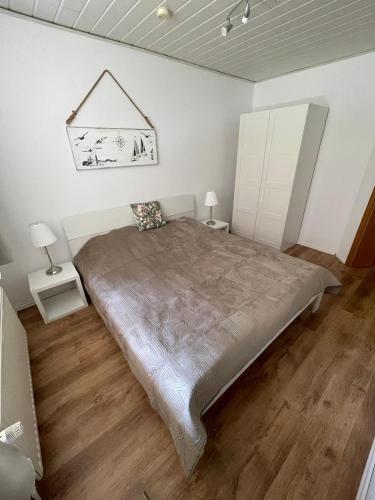 Postel nebo postele na pokoji v ubytování Nordsee Urlaubsparadies