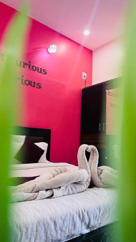 Letto o letti in una camera di THE JEYAM RESIDENCY - Opp To Mangrove Boating, Pondicherry - JR Groups