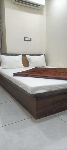 Ein Bett oder Betten in einem Zimmer der Unterkunft Hotel new star