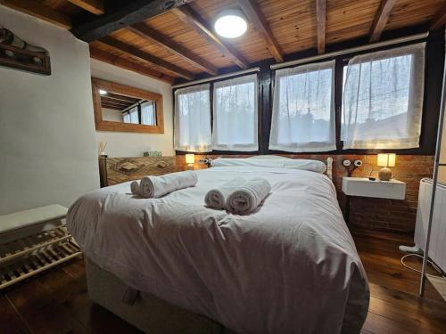 Ένα ή περισσότερα κρεβάτια σε δωμάτιο στο La casita de Orión,Piloña 37A01
