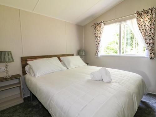 Katil atau katil-katil dalam bilik di Stork Lodge
