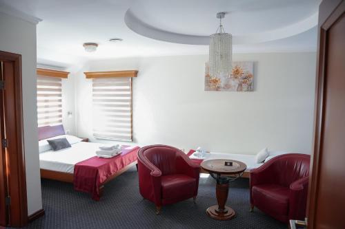 Postel nebo postele na pokoji v ubytování Comfort Lodge