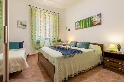 Ένα ή περισσότερα κρεβάτια σε δωμάτιο στο SARDINIA RE - Al Porto