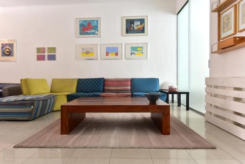 a living room with a couch and a coffee table at 16Sassi in Matera