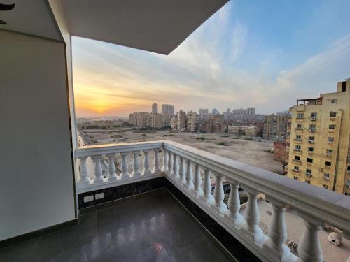 a balcony with a view of a city at شقة فاخرة وفيو خرافى فى maadi in Cairo