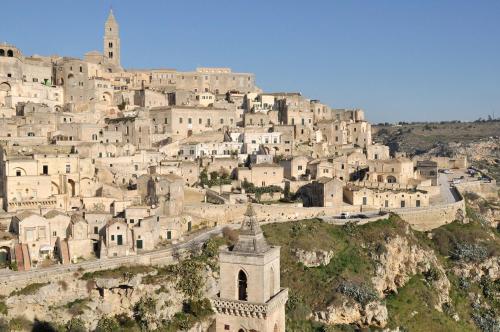 a village on the side of a mountain at 16Sassi in Matera