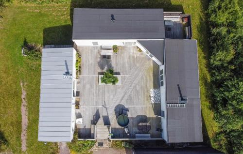 an overhead view of a building with a parking lot at Lovely Home In Lysekil With Sauna in Lysekil