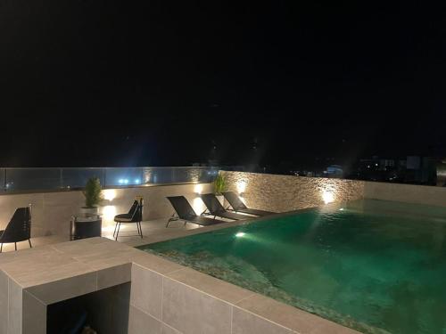 Bazén v ubytování Ixora 2 nebo v jeho okolí