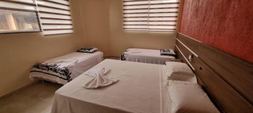 Ένα ή περισσότερα κρεβάτια σε δωμάτιο στο Tororoi Riberalta Apartments