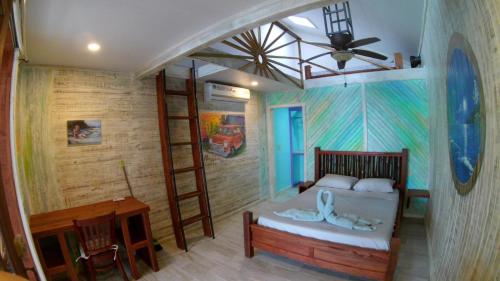 Ein Bett oder Betten in einem Zimmer der Unterkunft Skully's House