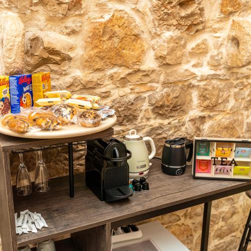 a table with a plate of food on it at Il Lamione in Quasani