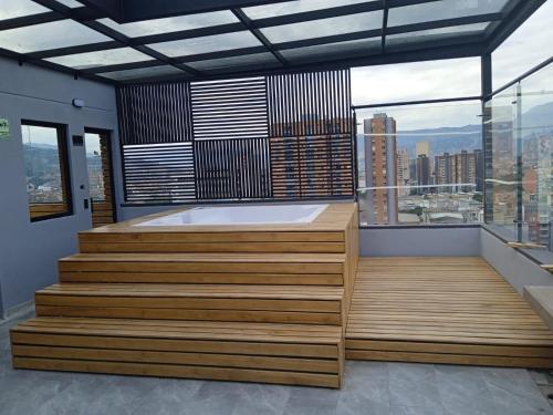 a large bathroom with a tub and a large window at Apartamento exclusivo en Sabaneta, Antioquia in Sabaneta