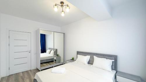 Un pat sau paturi într-o cameră la "One Top"