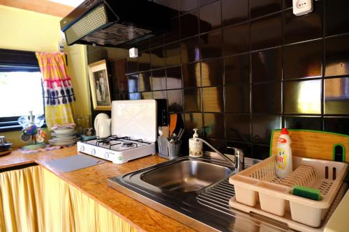 Virtuvė arba virtuvėlė apgyvendinimo įstaigoje Chill house