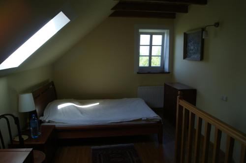 Łóżko lub łóżka w pokoju w obiekcie Apartamenty Nadedworce